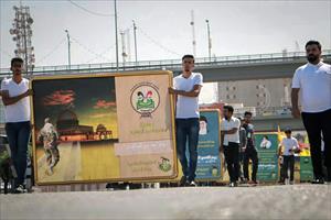 رژه نیروهای مقاومت اسلامی نجبای عراق در بغداد